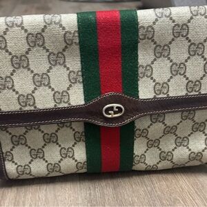 Gucci Beige Monogram Canvas Clutch with Red and Green Web

12.75"x6.75"x3"